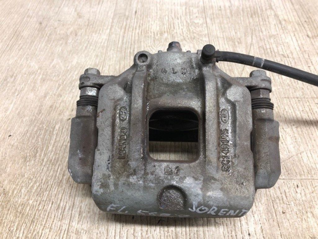 58110-C6000 | Суппорт тормозной передн. лев. KIA SORENTO UM 14-