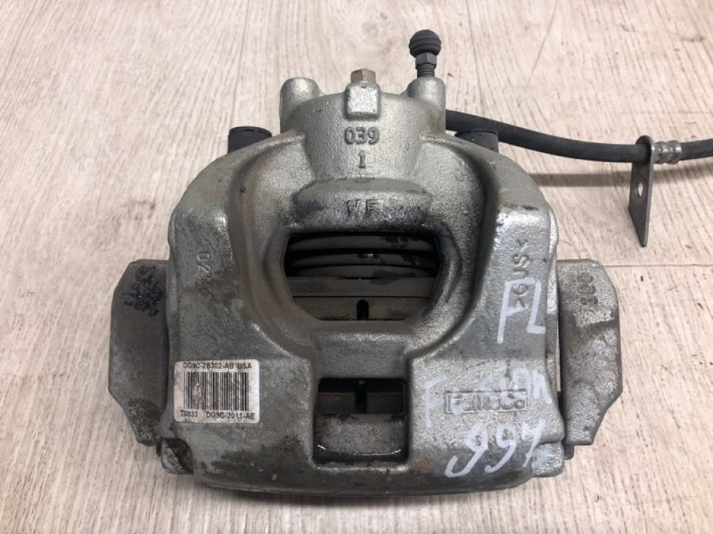 DG9Z-2B121-A | Суппорт тормозной передн. лев. FORD FUSION 14-