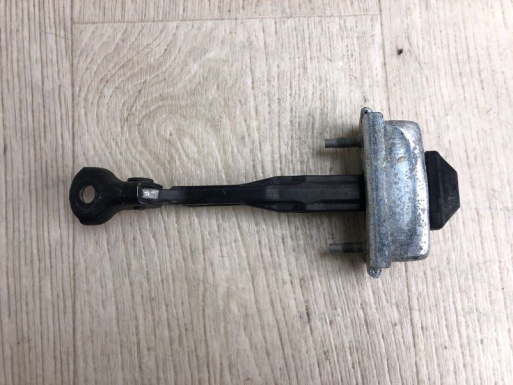 AE8Z-5423504-A | Обмежувач дверей передн. FORD FIESTA 08-17