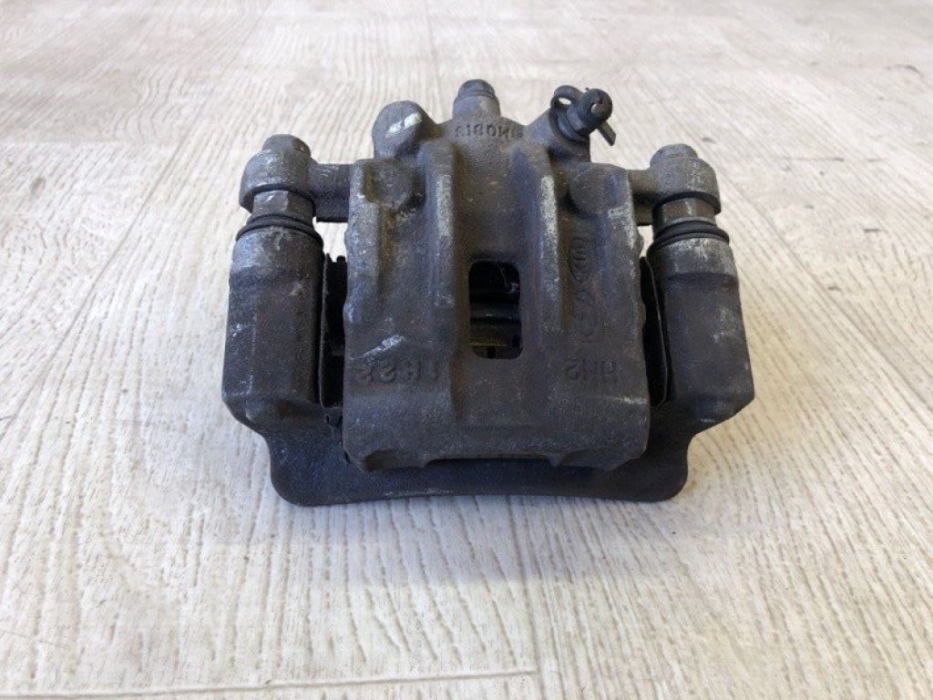 58230-1M400 | Суппорт тормозной задн. прав. KIA FORTE/CERATO TD 08-13