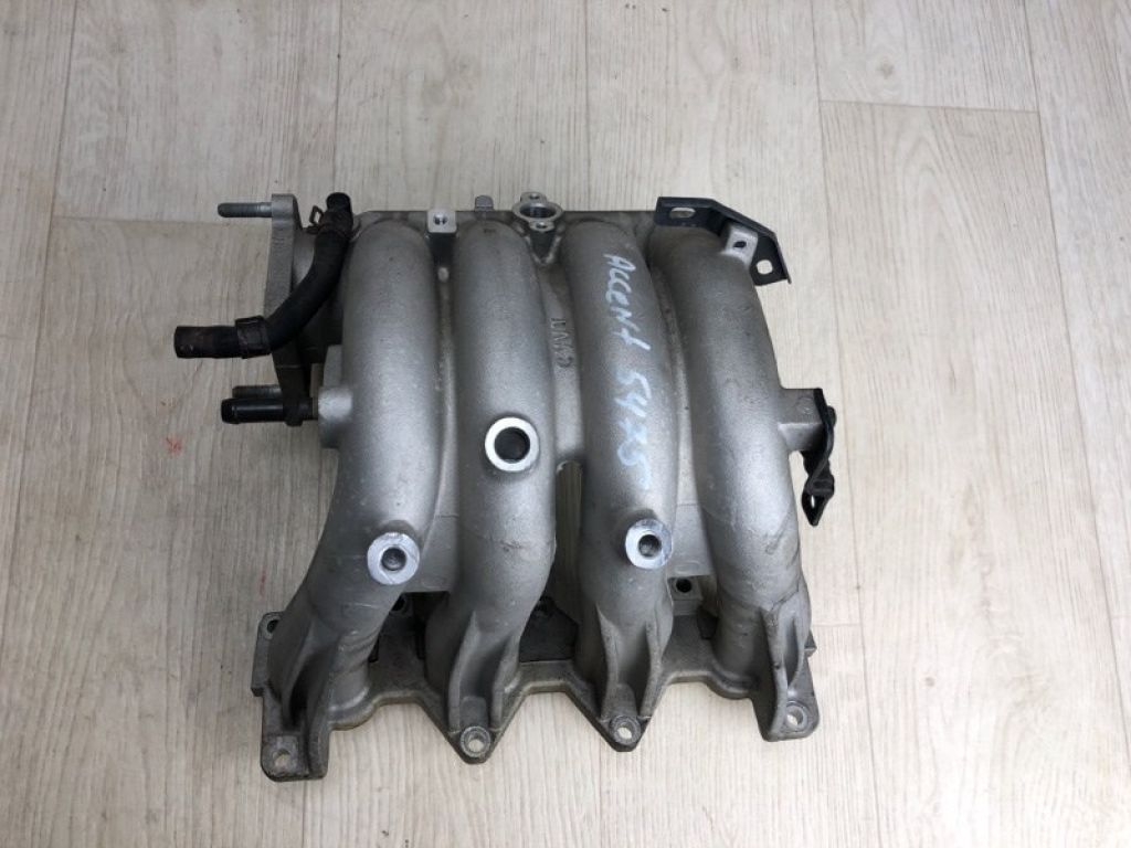 28310-26970 | Коллектор впускной HYUNDAI ACCENT MC 06-10