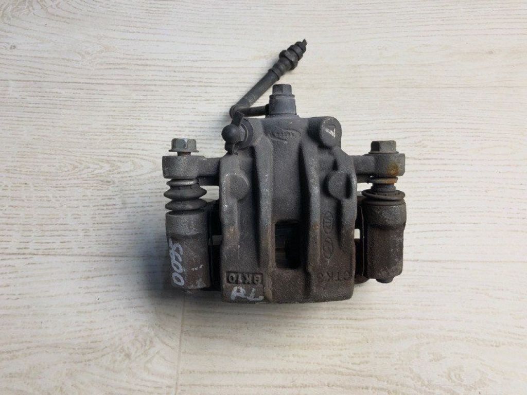 58310-1MA40 | Супорт гальмівний задн. лів. KIA FORTE/CERATO TD 08-13