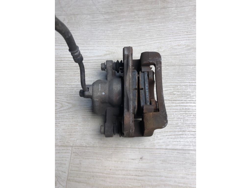 58310-1MA40 | Супорт гальмівний задн. лів. KIA FORTE/CERATO TD 08-13 - Фото 3