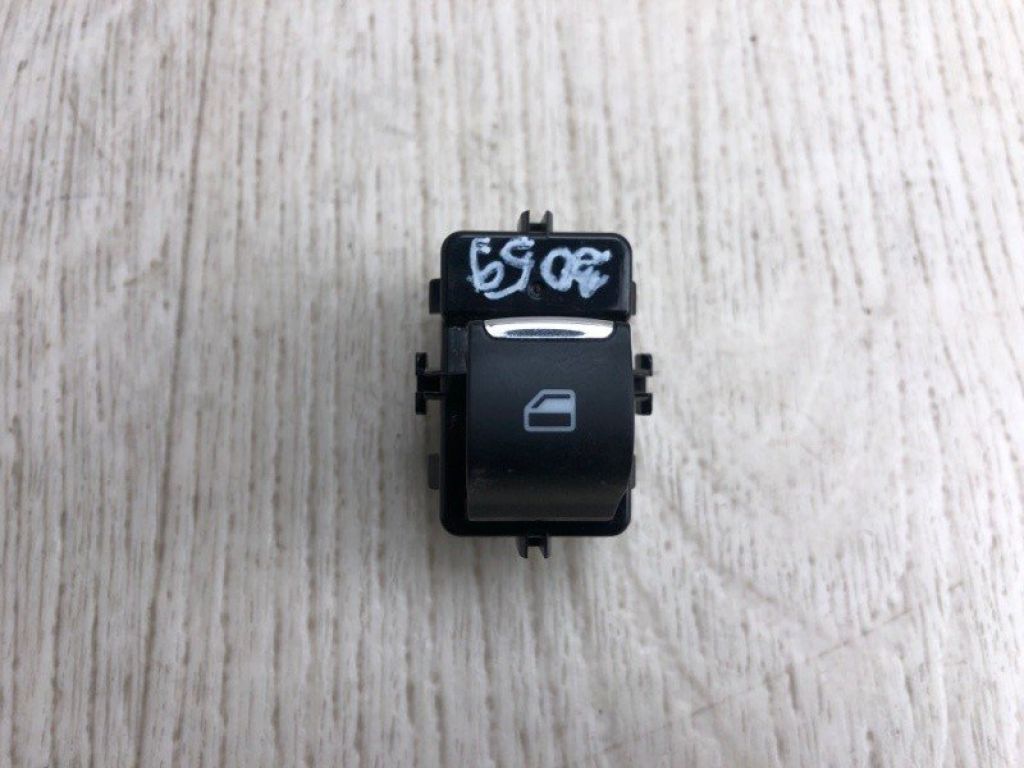 DG9Z-14529-AB | Кнопка стеклоподъемника задн. FORD FUSION 14-