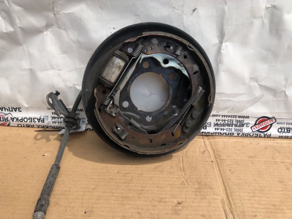 CP9Z-2212-A | Гальмівний механізм задн. лів. FORD FOCUS 10-18