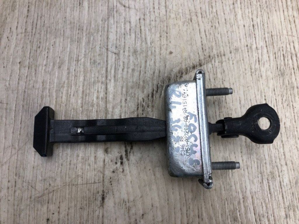 CP9Z-5823500-A | Ограничитель двери задн. лев. FORD FOCUS 10-18