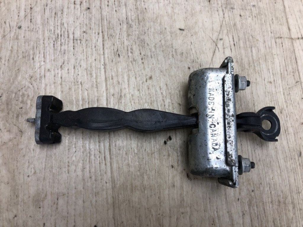 AT4Z-7823552-A | Обмежувач дверей передн. лів. FORD EDGE 06-14 - Фото 2