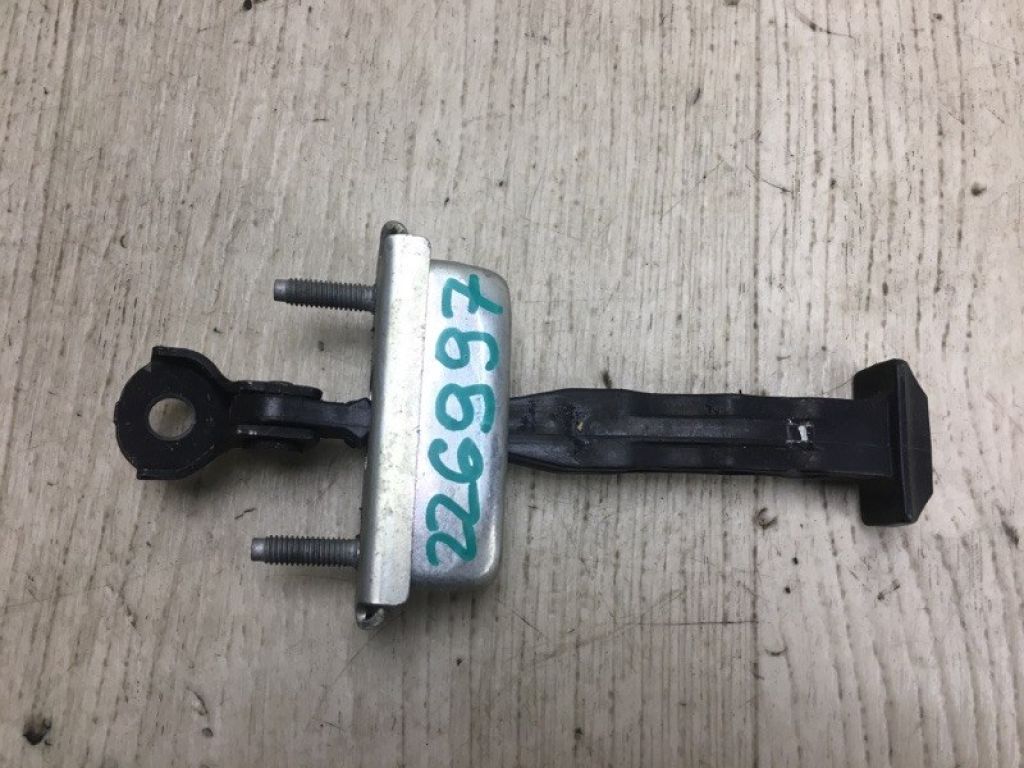 CP9Z-5827204-A | Обмежувач дверей задн. лів. FORD FOCUS 10-18