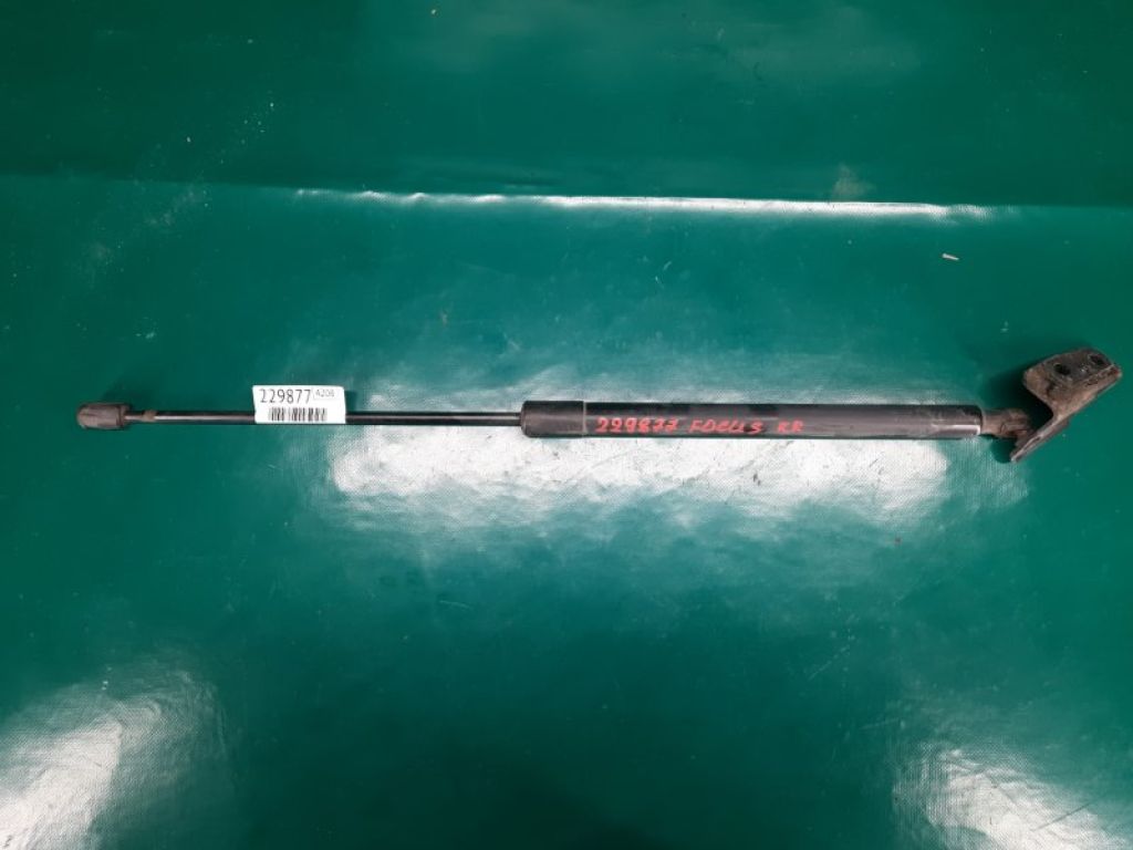 CP9Z-58406A10-B | Амортизатор крышки багажника прав. FORD FOCUS 10-18
