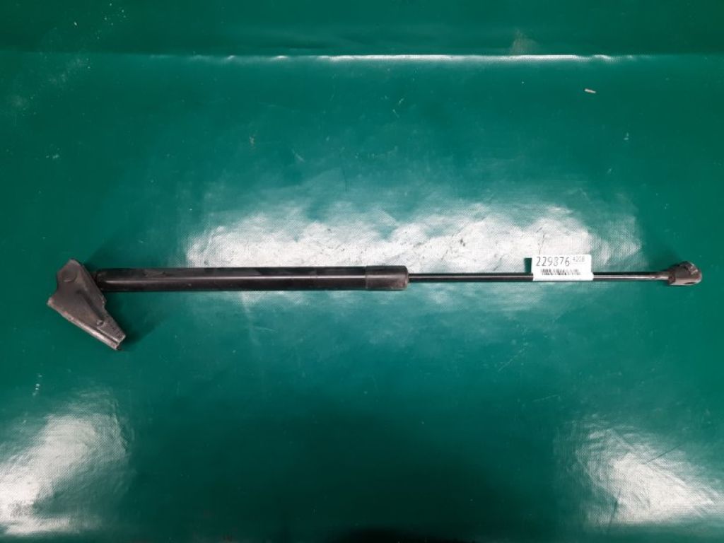 CP9Z-58406A10-B | Амортизатор кришки багажника лів. FORD FOCUS 10-18