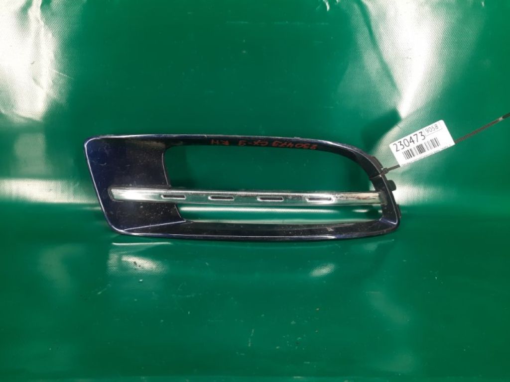 TD12-50-C11E12 | Накладка противотуманной фары передн. прав. MAZDA CX-9 06-16