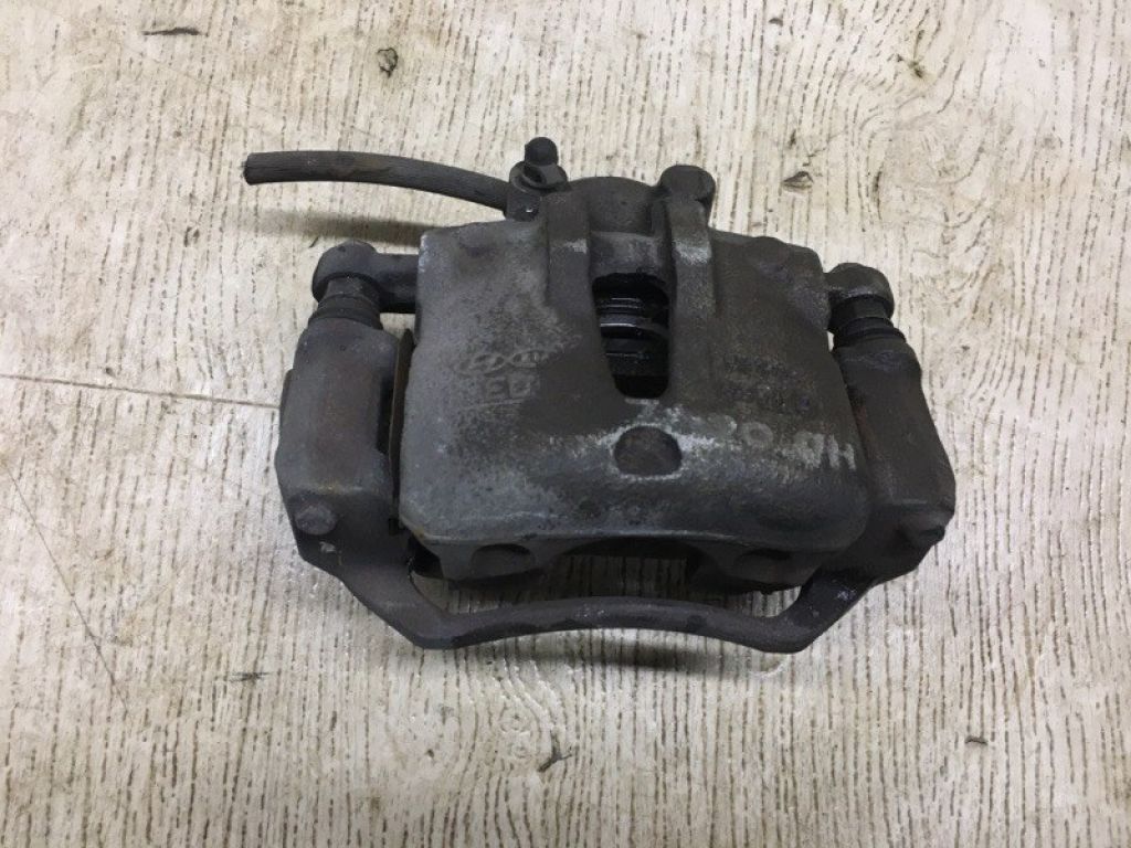 58110-2L000 | Суппорт тормозной передн. лев. HYUNDAI ELANTRA HD 06-11