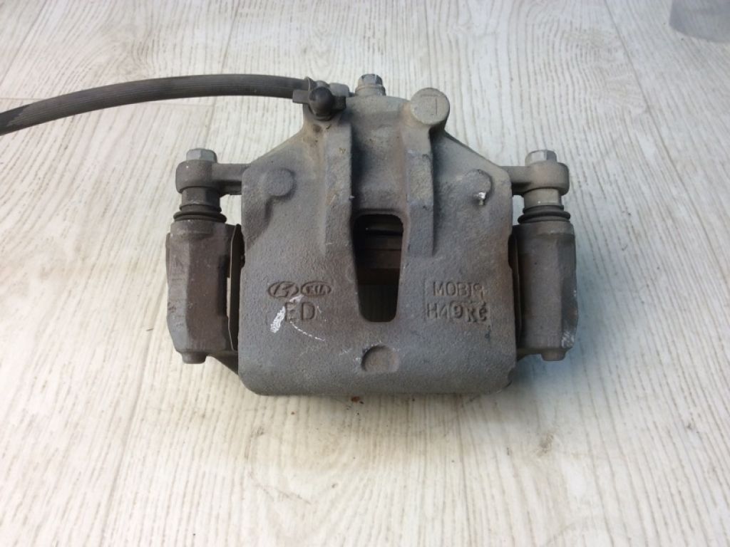 58110-2L000 | Суппорт тормозной передн. лев. HYUNDAI ELANTRA HD 06-11