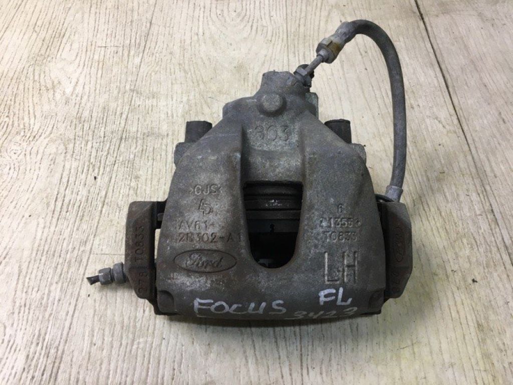 H2MZ-2V121-BRM | Суппорт тормозной передн. лев. FORD FOCUS 10-18