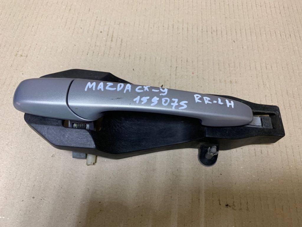 TD84-59-410D 06 | Ручка двері зовнішня задн. лів. MAZDA CX-9 06-16