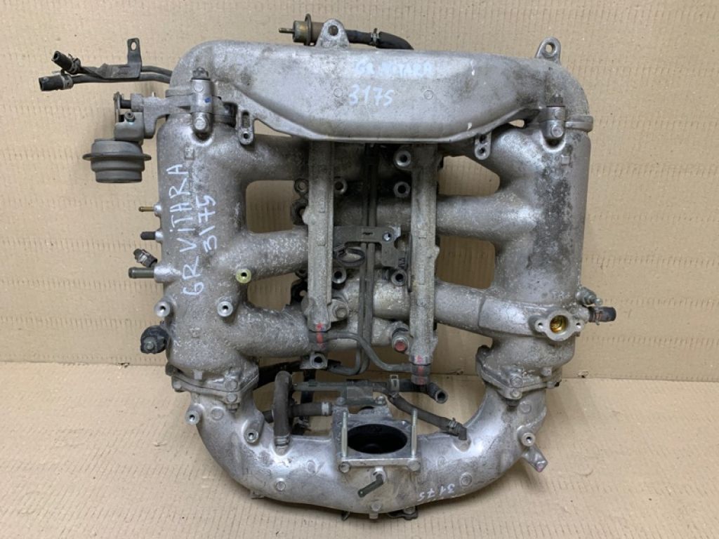 13110-66J00 | Колектор впускний SUZUKI GRAND VITARA 05-15