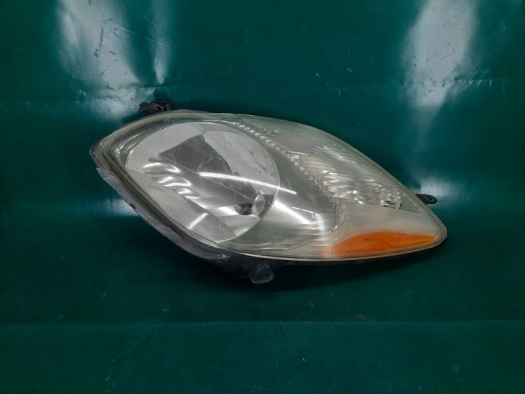 81130-52B50 | Фара лів. TOYOTA YARIS 05–11