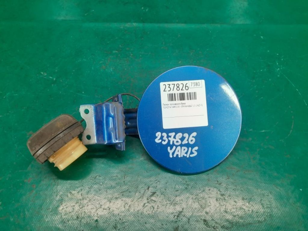77350-52130 | Лючок паливного бака TOYOTA YARIS 05–11