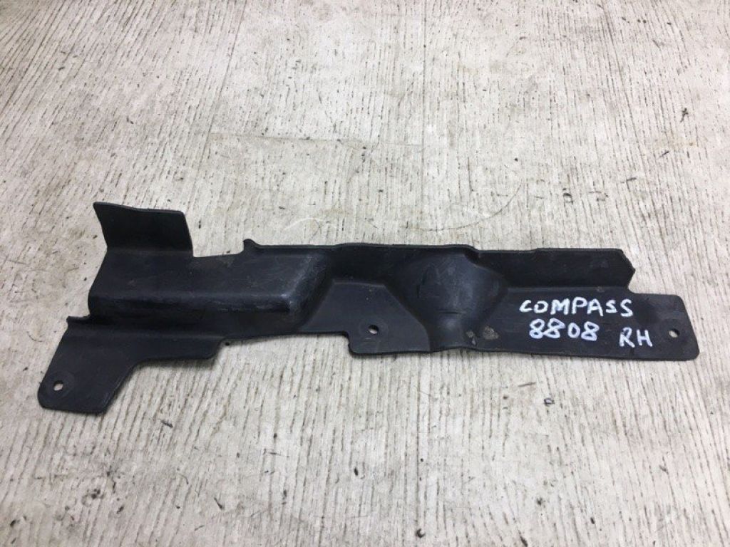 5191255AA | Дефлектор радіатора лів. JEEP COMPASS 06-16