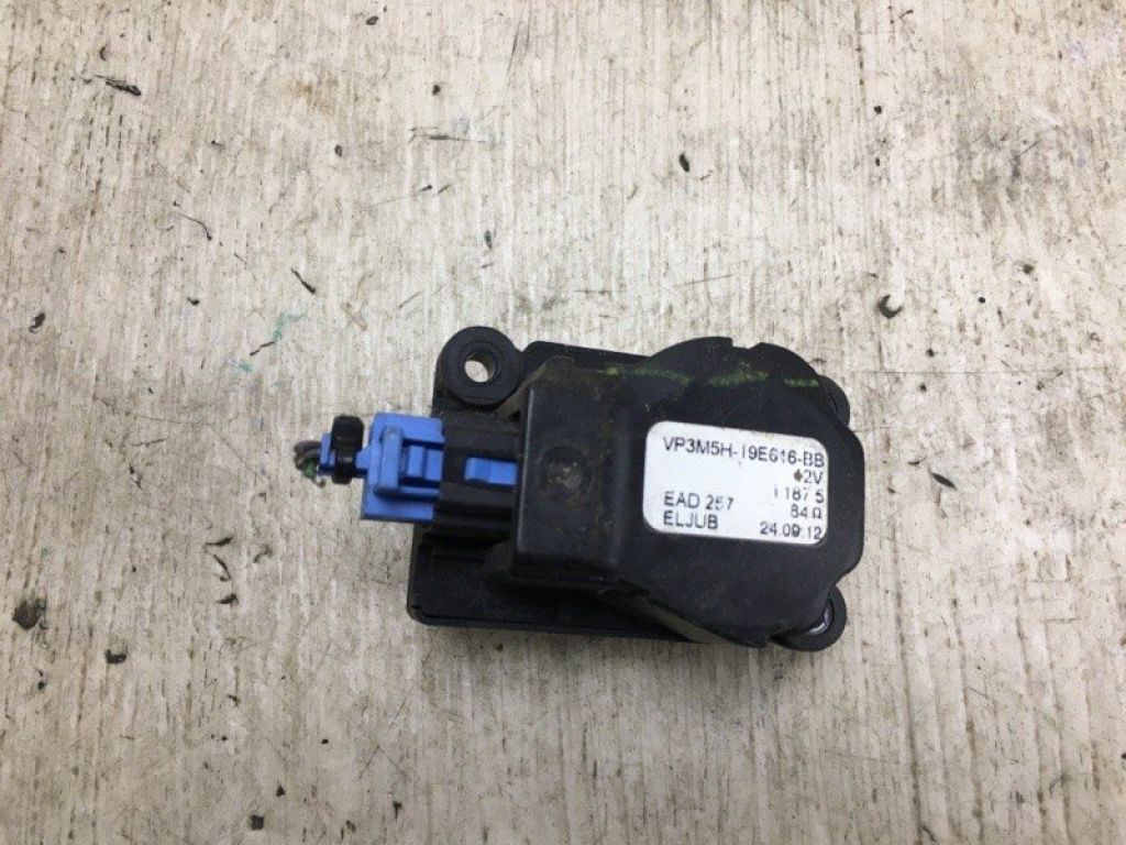 AV6Z-19E616-B | Моторчик заслінки пічки FORD ESCAPE 12-19