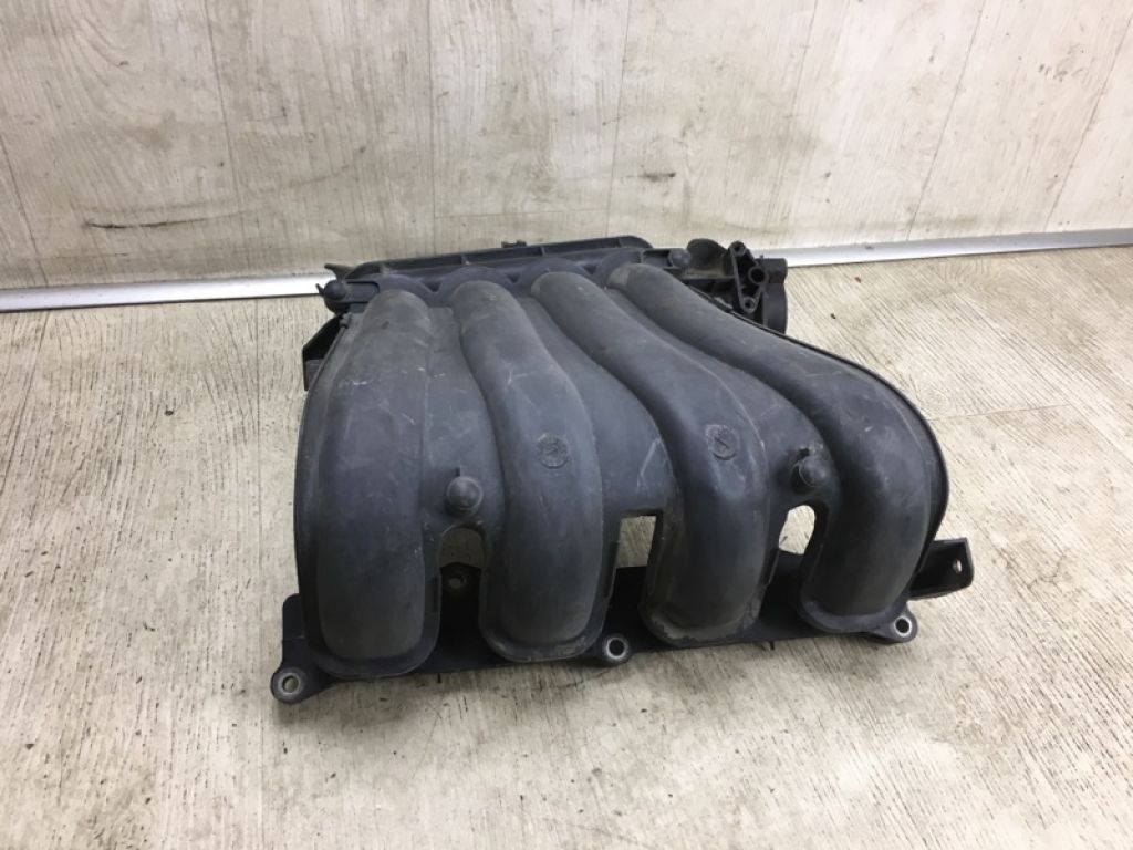 14001-ET00A | Колектор впускний NISSAN NV200 USA 13-