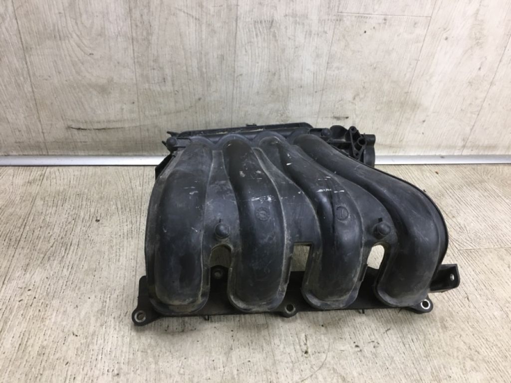 14001-ET00A | Колектор впускний NISSAN NV200 USA 13-