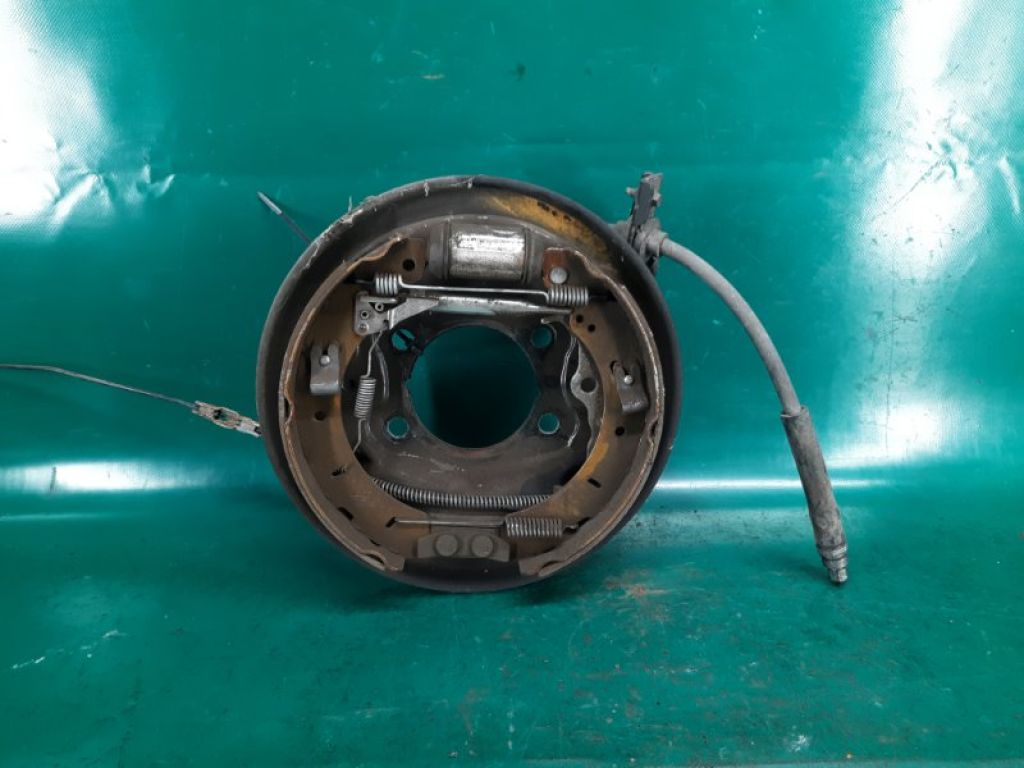 CP9Z-2212-A | Тормозной механизм задн. лев. FORD FOCUS 10-18
