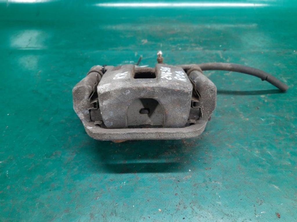 44001-JG00A | Суппорт тормозной задн. прав. NISSAN ROGUE 08-15
