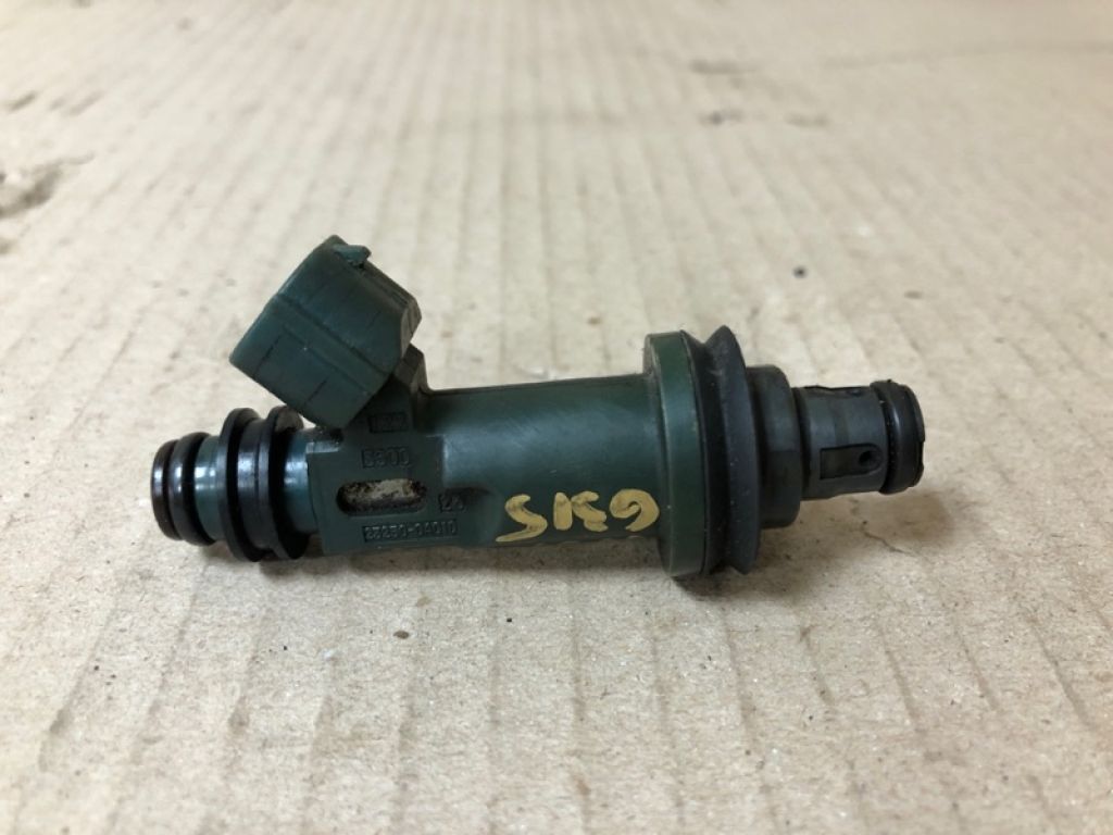 23209-0A010 | Форсунка топливная TOYOTA AVALON 99-05