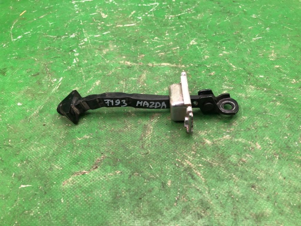 BHN9-72-270 | Ограничитель двери задн. MAZDA 3 BM 13-19