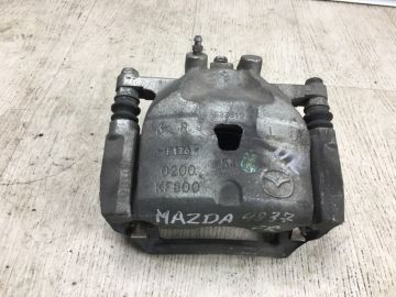 Супорт гальмівний передн. прав. MAZDA 3 BM 13-19