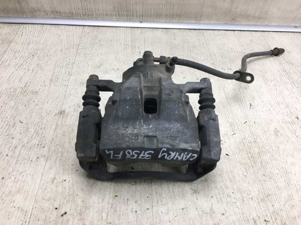 47750-06220 | Суппорт тормозной передн. лев. TOYOTA CAMRY 40 06-11
