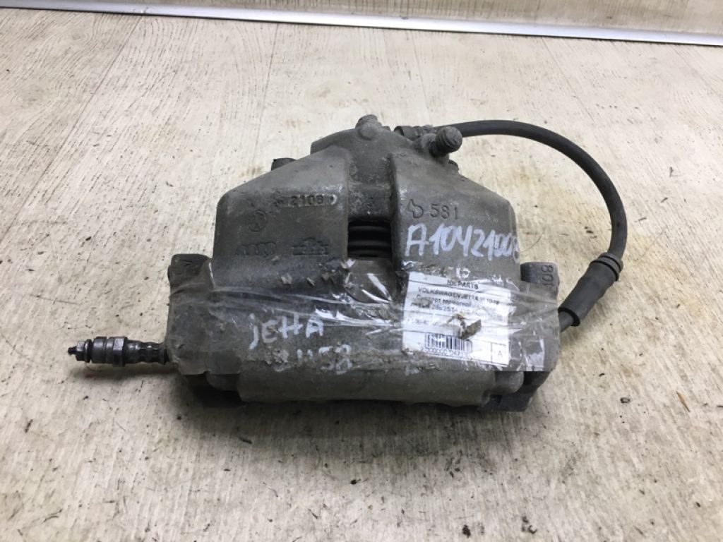 1K0 615 123 E | Суппорт тормозной передн. лев. VOLKSWAGEN JETTA USA 10-17