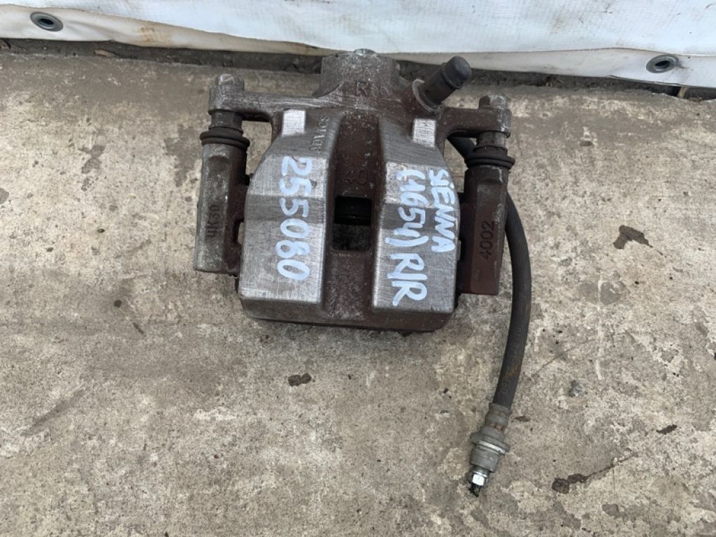 47830-0E070 | Суппорт тормозной задн. прав. TOYOTA SIENNA 11-16