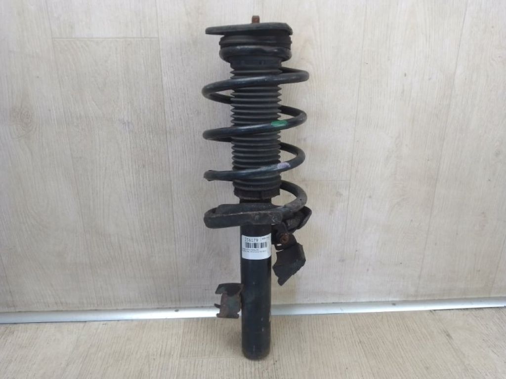 BBM2-34-900C | Амортизатор передн. лев. MAZDA 3 BL 09-13