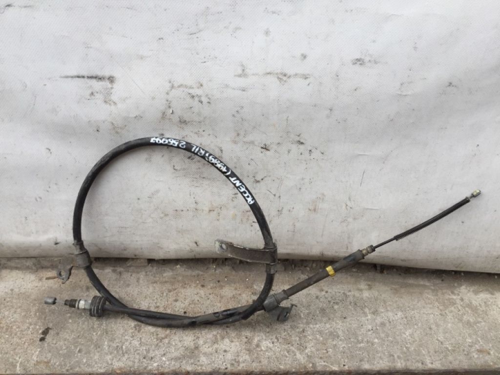 59760-1R000 | Трос стояночного тормоза задн. лев. HYUNDAI ACCENT RB 10-