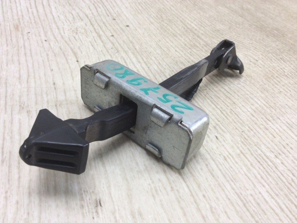 TD11-72-270G | Ограничитель двери задн. MAZDA CX-9 06-16