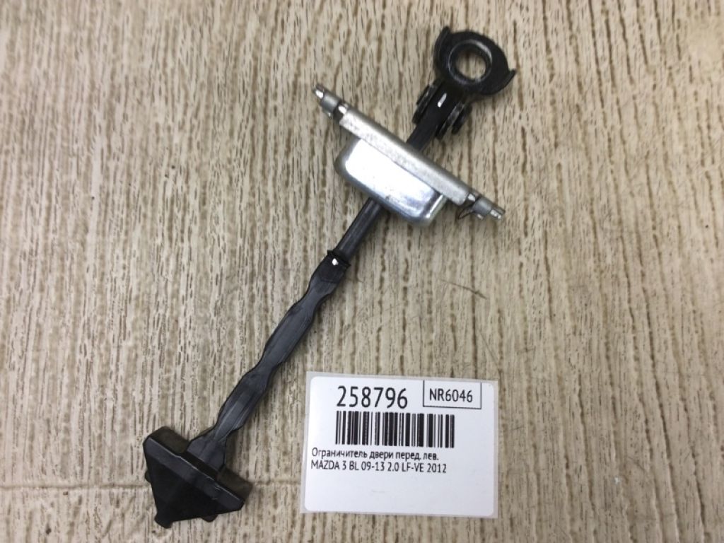 BBM4-58-270C | Ограничитель двери передн. MAZDA 3 BL 09-13 - Фото 2