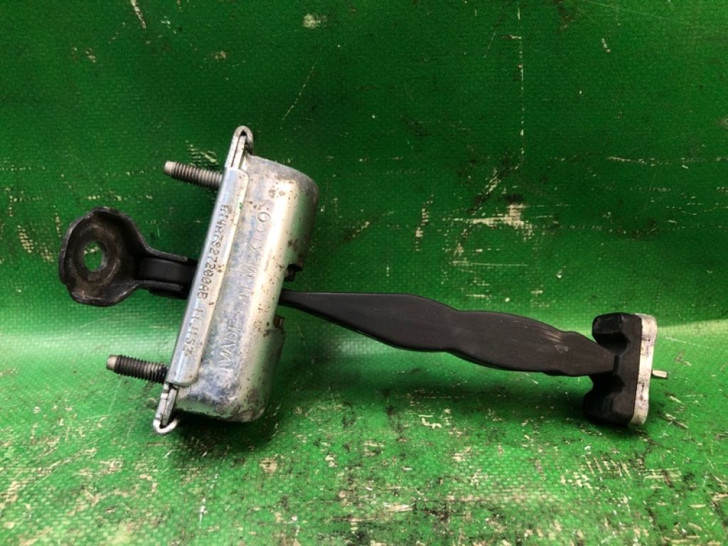 7T4Z-7827204-A | Обмежувач дверей задн. FORD EDGE 06-14