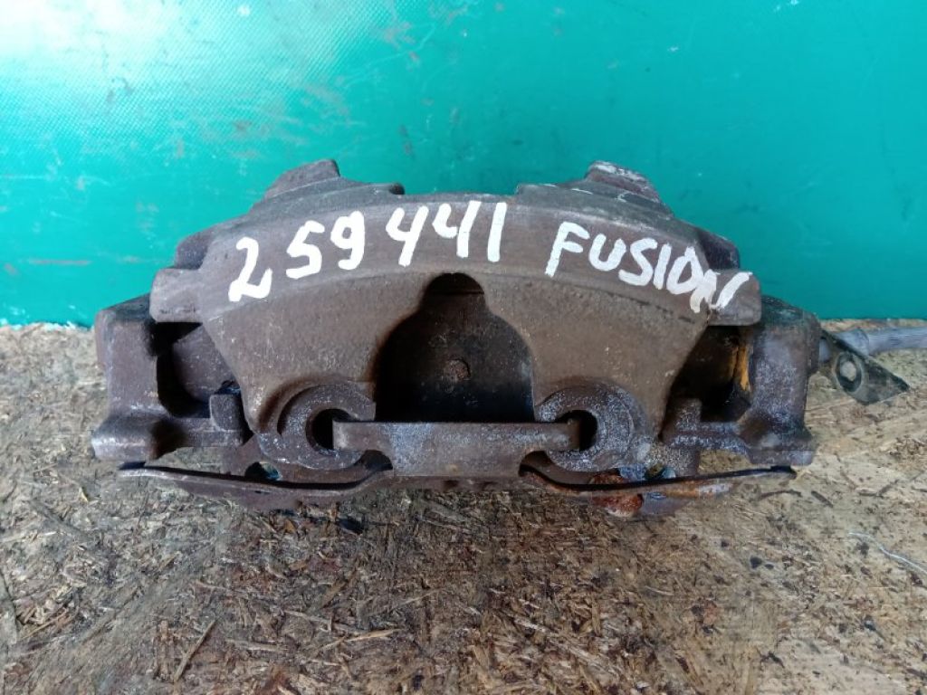 DG9Z-2B121-A | Супорт гальмівний передн. лів. FORD FUSION 14- - Фото 3