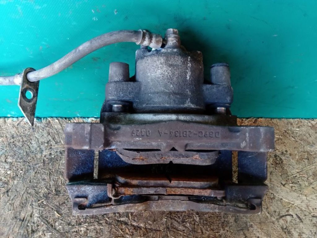 DG9Z-2B121-A | Супорт гальмівний передн. лів. FORD FUSION 14- - Фото 4