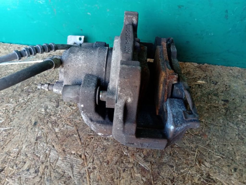 DG9Z-2B121-A | Супорт гальмівний передн. лів. FORD FUSION 14- - Фото 6