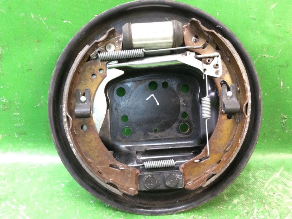 8V5Z-2212-B | Тормозной механизм задн. лев. FORD FIESTA 08-17