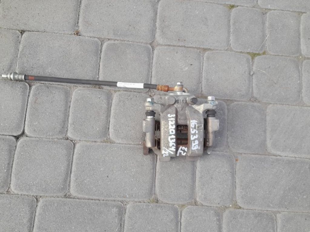 44011-1AA0A | Супорт гальмівний задн. лів. INFINITI Q50 15-20