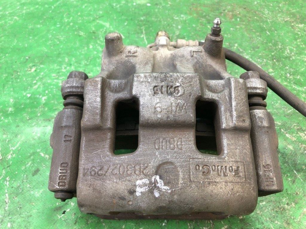 BT4Z-2B121-A | Суппорт тормозной передн. лев. FORD EDGE 06-14