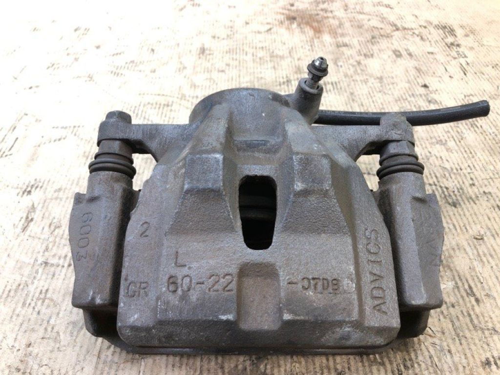 47750-02400 | Суппорт тормозной передн. лев. TOYOTA MATRIX 08-14