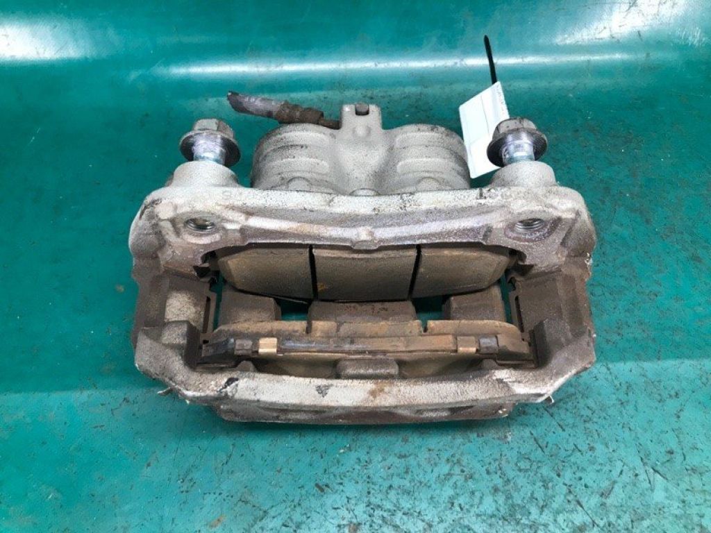 41011-1VA0B | Суппорт тормозной передн. лев. NISSAN LEAF 10-17 - Фото 5