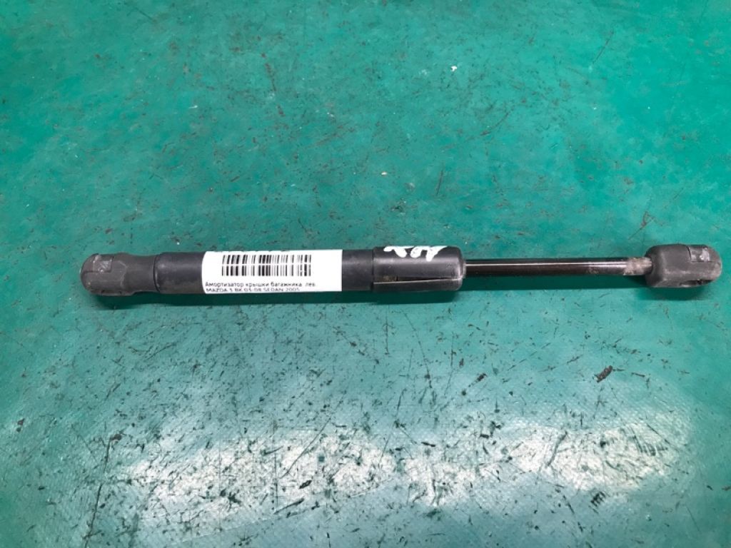 BN8V-56-930A | Амортизатор кришки багажника лів. MAZDA 3 BK 03-08 - Фото 2