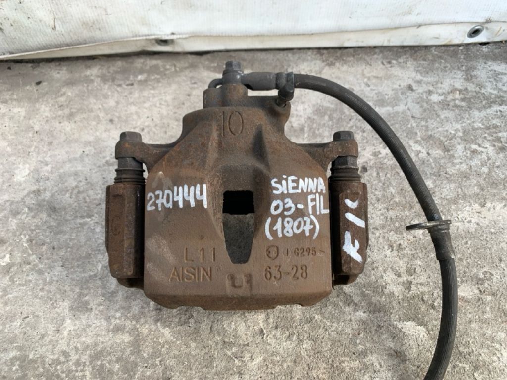 47750-08030 | Суппорт тормозной передн. лев. TOYOTA SIENNA 03-10