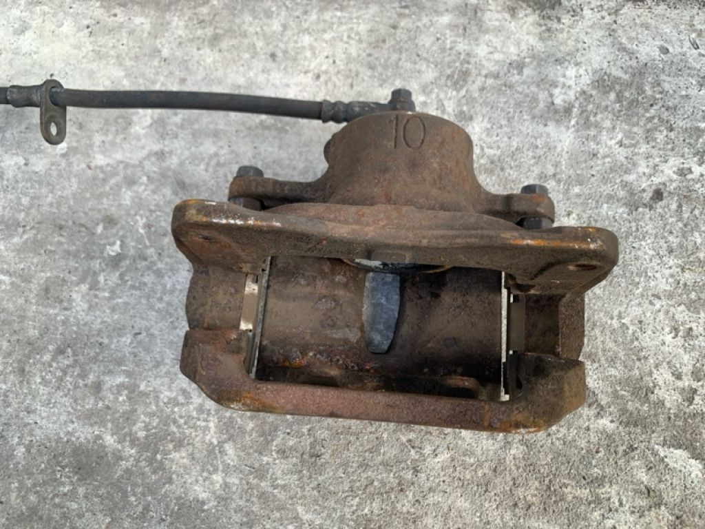 47750-08030 | Суппорт тормозной передн. лев. TOYOTA SIENNA 03-10 - Фото 4